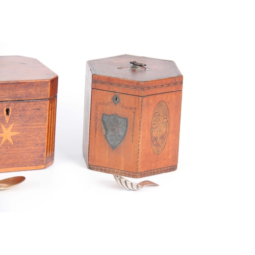 911 - A GEORGE III MAHOGANY HEXAGONAL SHAPED INLAID TEA CADDY with silver escutcheon shield and handle, in... 