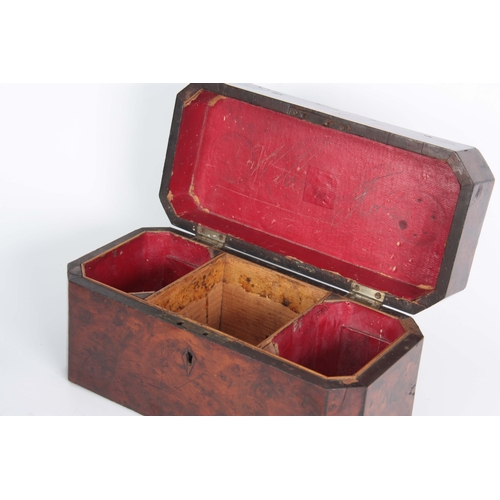 913 - A GEORGE III YEW WOOD VENEERED TEA CADDY of rectangular form with clipped corners and hinged brass h... 