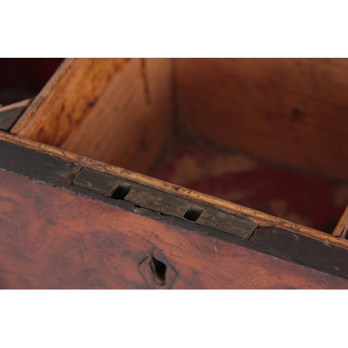 913 - A GEORGE III YEW WOOD VENEERED TEA CADDY of rectangular form with clipped corners and hinged brass h... 