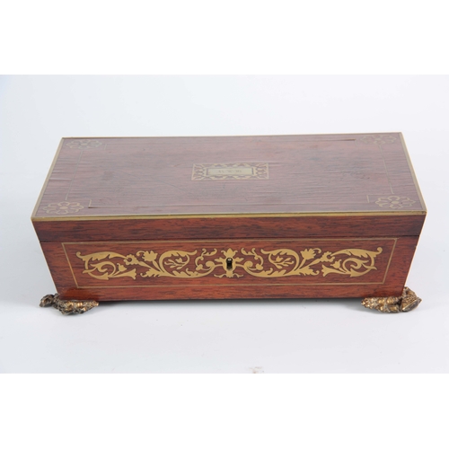 915 - A REGENCY BRASS INLAID ROSEWOOD GLOVE BOX having angled sides and leaf cast brass side handles and f... 