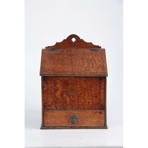 918 - AN 18TH CENTURY WALNUT CROSS-BANDED OAK CANDLE BOX with angled hinged lid above a frieze drawer fitt... 