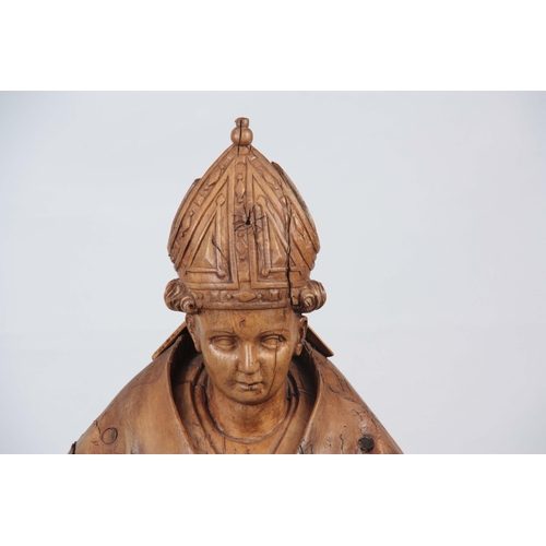 934 - AN EARLY 15TH / 16TH CENTURY CARVED FRUITWOOD FIGURE OF A POPE 113cm high.