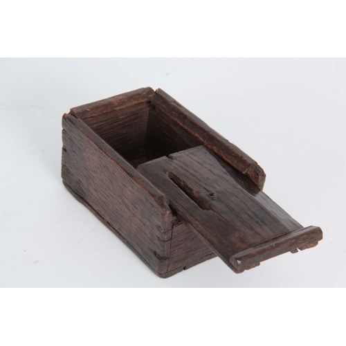 939 - A RARE 16TH CENTURY OAK MONEY BOX with a sliding top the lock missing 10cm wide 7cm wide  5cm high.