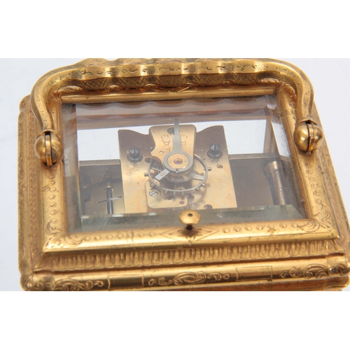 970 - A 19TH CENTURY FRENCH GILT BRASS ENGRAVED GORGE CASE CARRIAGE CLOCK REPEATER with folding handle and... 