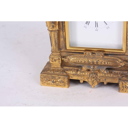 974 - A LATE 19th CENTURY FRENCH GILT CASED CARRIAGE CLOCK with figural columns enclosing a 2.25