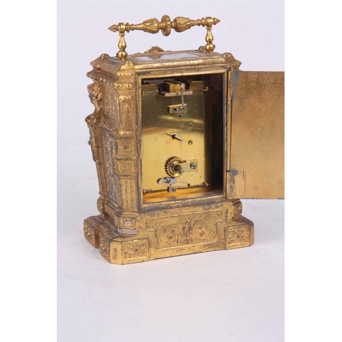 974 - A LATE 19th CENTURY FRENCH GILT CASED CARRIAGE CLOCK with figural columns enclosing a 2.25