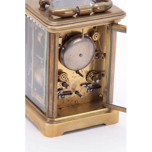 975 - A 19TH CENTURY FRENCH BRASS CARRIAGE CLOCK REPEATER WITH ALARM the corniche case with folding handle... 