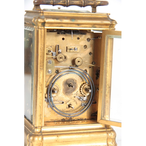 982 - A 19TH CENTURY FRENCH GILT BRASS GORGE CASE REPEATING CARRIAGE CLOCK WITH ALARM the Sevres style por... 