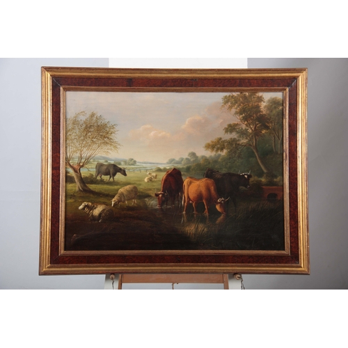 817 - A 19TH CENTURY OIL ON CANVAS DEPICTING CATTLE WATERING IN A LANDSCAPE SETTING signed and in the circ... 