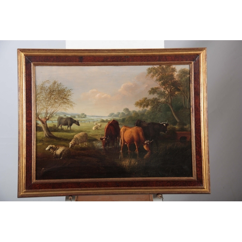 817 - A 19TH CENTURY OIL ON CANVAS DEPICTING CATTLE WATERING IN A LANDSCAPE SETTING signed and in the circ... 