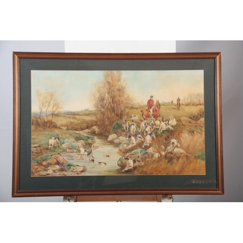 850 - A 19TH CENTURY WATERCOLOUR River landscape scene with huntsmen on horseback with a pack of foxhounds... 