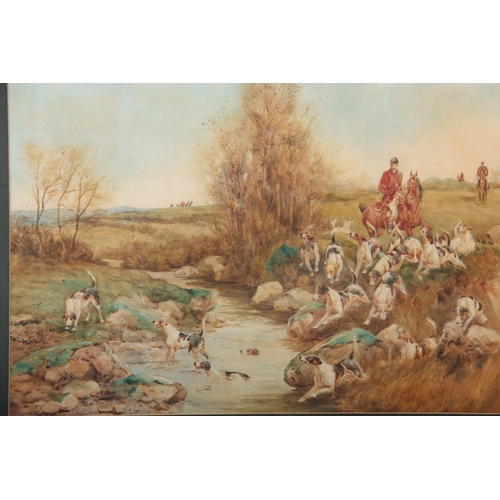 850 - A 19TH CENTURY WATERCOLOUR River landscape scene with huntsmen on horseback with a pack of foxhounds... 