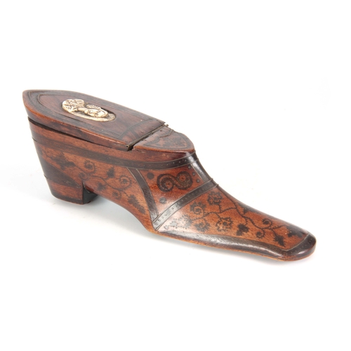 865 - AN 18TH CENTURY WALNUT TABLE SNUFF BOX IN THE FORM OF A SHOE decorated in pique work and the lid set... 