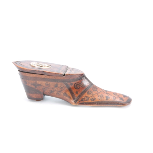 865 - AN 18TH CENTURY WALNUT TABLE SNUFF BOX IN THE FORM OF A SHOE decorated in pique work and the lid set... 