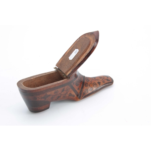 865 - AN 18TH CENTURY WALNUT TABLE SNUFF BOX IN THE FORM OF A SHOE decorated in pique work and the lid set... 