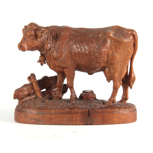 871 - A 19TH CENTURY SWISS BLACK FOREST CARVED LINDEN WOOD COW POSSIBLY BY HUGGLER finely modelled mounted... 