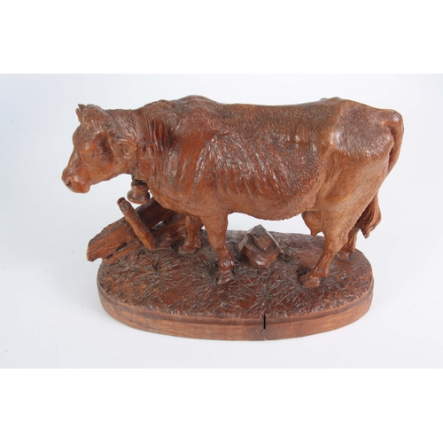 871 - A 19TH CENTURY SWISS BLACK FOREST CARVED LINDEN WOOD COW POSSIBLY BY HUGGLER finely modelled mounted... 