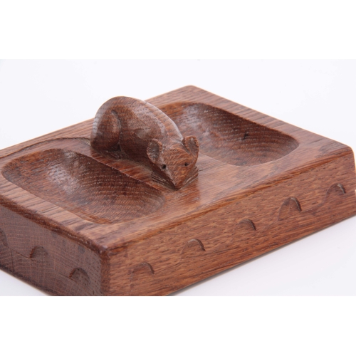 880 - AN EARLY ROBERT MOUSEMAN THOMPSON OAK PIN TRAY of rectangular form with arcaded moulded edge and car... 