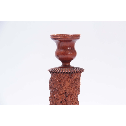 883 - AN UNUSUAL PAIR OF GEORGE III YEW WOOD TREEN CANDLESTICKS with turned square bases knotted burr wood... 