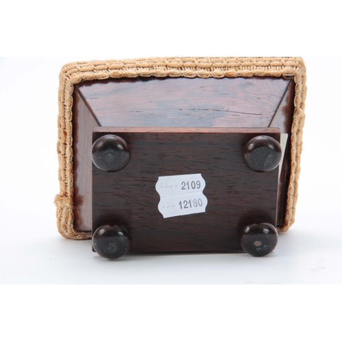 887 - AN EARLY VICTORIAN ROSEWOOD PIN CUSHION having chamfered sides and beaded moulding on bun feet 13.5c... 