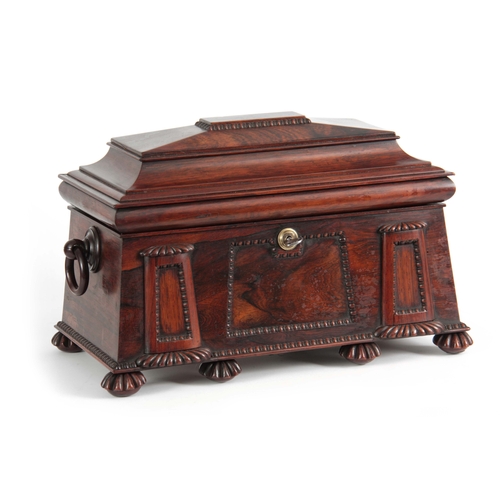 893 - A FINE REGENCY ROSEWOOD EGYPTIAN REVIVAL TEA CADDY of sarcophagus form with gadrooned mouldings and ... 