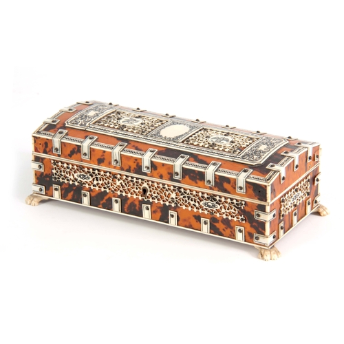 904 - A LATE 19th CENTURY DOMED TOP ANGLO-INDIAN TORTOISESHELL AND IVORY BOX with pierced panels supported... 