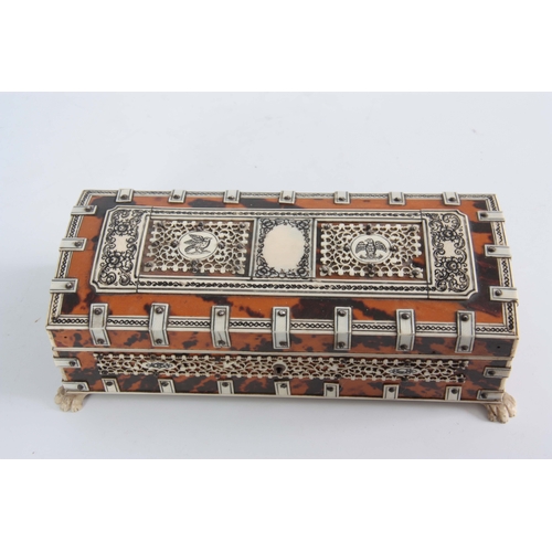 904 - A LATE 19th CENTURY DOMED TOP ANGLO-INDIAN TORTOISESHELL AND IVORY BOX with pierced panels supported... 