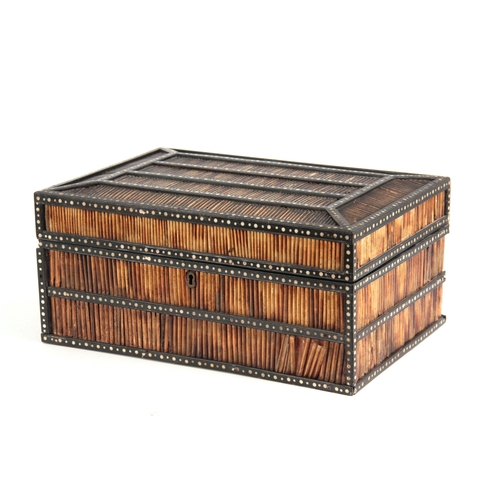 906 - A 19TH CENTURY ANGLO-INDIAN PORCUPINE QUILS BOX with panelled chamfered top having ebony and bone in... 