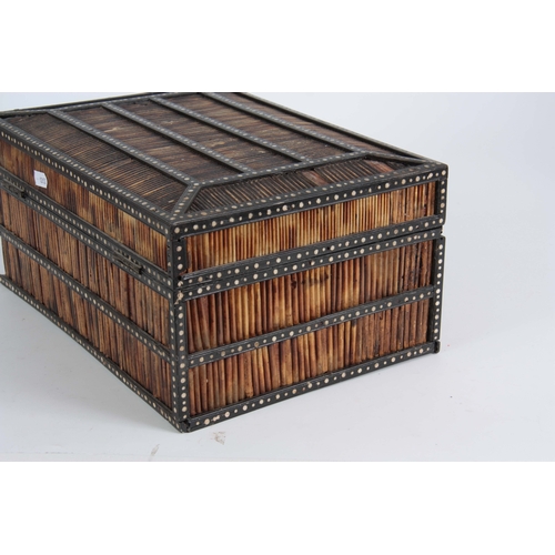 906 - A 19TH CENTURY ANGLO-INDIAN PORCUPINE QUILS BOX with panelled chamfered top having ebony and bone in... 