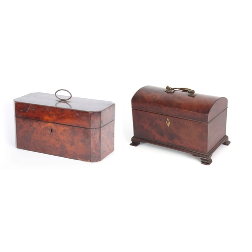 913 - A GEORGE III YEW WOOD VENEERED TEA CADDY of rectangular form with clipped corners and hinged brass h... 