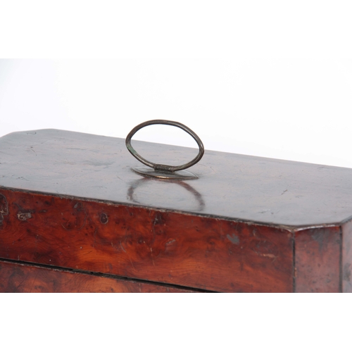 913 - A GEORGE III YEW WOOD VENEERED TEA CADDY of rectangular form with clipped corners and hinged brass h... 