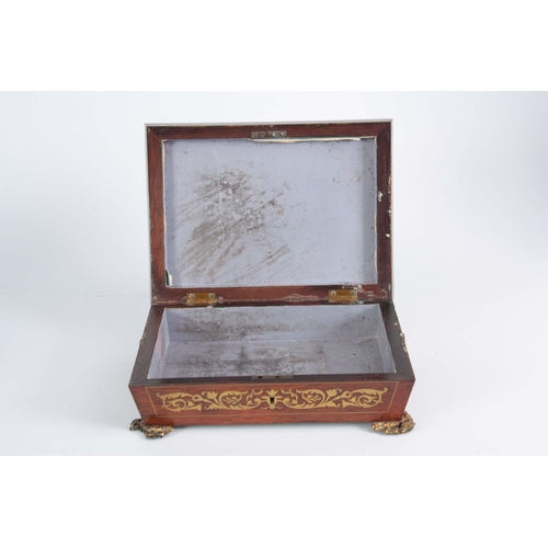 915 - A REGENCY BRASS INLAID ROSEWOOD GLOVE BOX having angled sides and leaf cast brass side handles and f... 