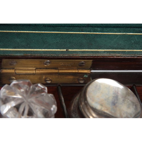 916 - A VICTORIAN ROSEWOOD DRESSING TABLE BOX with mirrored inner lid  and partly fitted interior of bottl... 