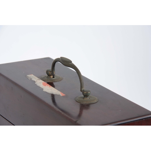 923 - A GEORGE III MAHOGANY APOTHECARY BOX with hinged lid and front opening drawer.  Brass swan-necked ha... 