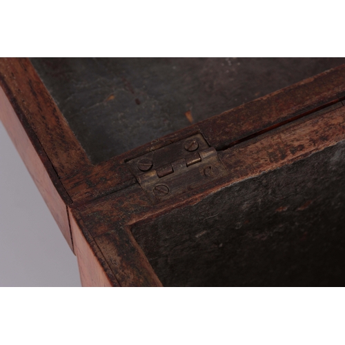 925 - A GEORGE III RECTANGULAR PEARWOOD AND EBONY VENEERED TEA CADDY having segmented hinged top revealing... 