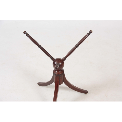 930 - A REGENCY EBONISED INLAID MAHOGANY CAT / BOWL STAND with ring turned revolving top above a tripod sp... 