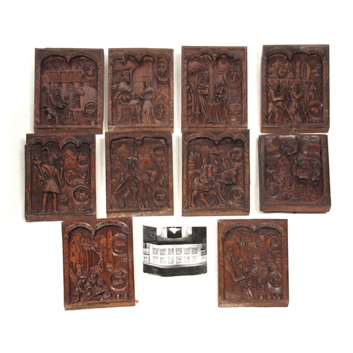 933 - A SET OF TEN 19TH CENTURY GOTHIC REVIVAL CARVED OAK PANELS - probably Flemish each depicting figures... 