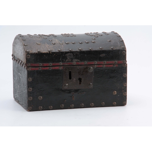 942 - AN EARLY 18TH CENTURY DOME TOPPED LEATHER BOUND AND BRASS STUDDED TRUNK of small proportions initial... 