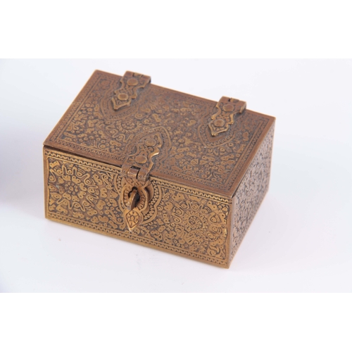 943 - A COLLECTION OF THREE SMALL PERSIAN BOXES, a White metal engraved with a geometric pattern having a ... 