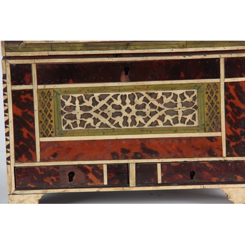 944 - A LATE 17th CENTURY INDO-PORTUGUESE TORTOISESHELL, HORN AND IVORY BANDED CASKET having mirrored back... 