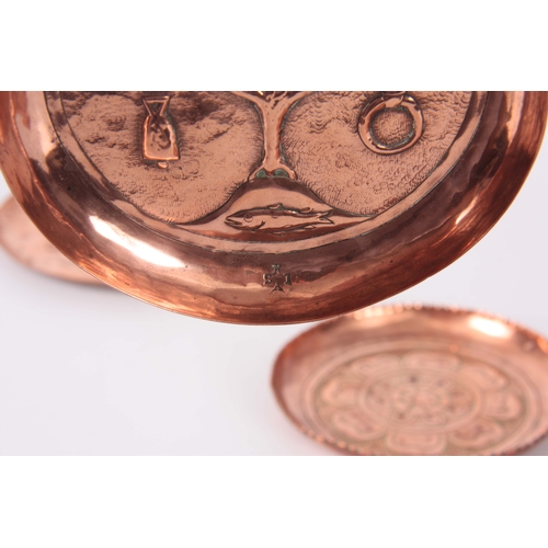 949 - A COLLECTION OF FOUR ARTS AND CRAFTS COPPER TRAYS a rectangular tray with embossed fish 22cm wide, a... 