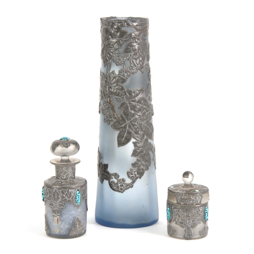 954 - A 20TH CENTURY SUITE OF ARTS AND CRAFTS PEWTER MOUNTED GLASSWARE including a tapering cylindrical va... 