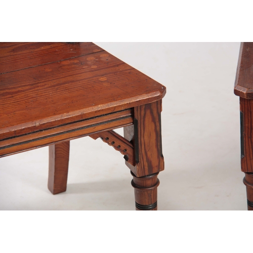 959 - A PAIR OF LATE 19TH CENTURY AESTHETIC PERIOD GOTHIC REVIVAL PITCH PINE HALL CHAIRS IN THE MANER OF A... 