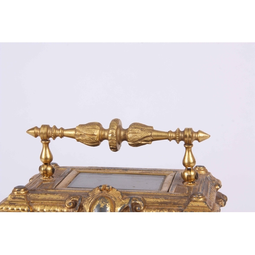 974 - A LATE 19th CENTURY FRENCH GILT CASED CARRIAGE CLOCK with figural columns enclosing a 2.25