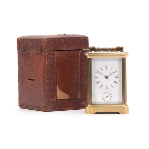 975 - A 19TH CENTURY FRENCH BRASS CARRIAGE CLOCK REPEATER WITH ALARM the corniche case with folding handle... 