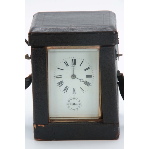 977 - A LATE 19th CENTURY FRENCH GRAND SONNERIE REPEATING CARRIAGE CLOCK the brass corniche case enclosing... 