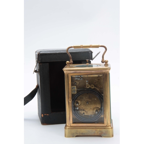 977 - A LATE 19th CENTURY FRENCH GRAND SONNERIE REPEATING CARRIAGE CLOCK the brass corniche case enclosing... 