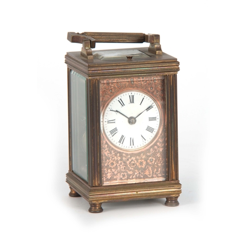 978 - A LATE 19th CENTURY FRENCH REPEATING CARRIAGE CLOCK the brass case with reeded corners enclosing a f... 