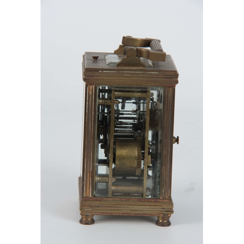 978 - A LATE 19th CENTURY FRENCH REPEATING CARRIAGE CLOCK the brass case with reeded corners enclosing a f... 