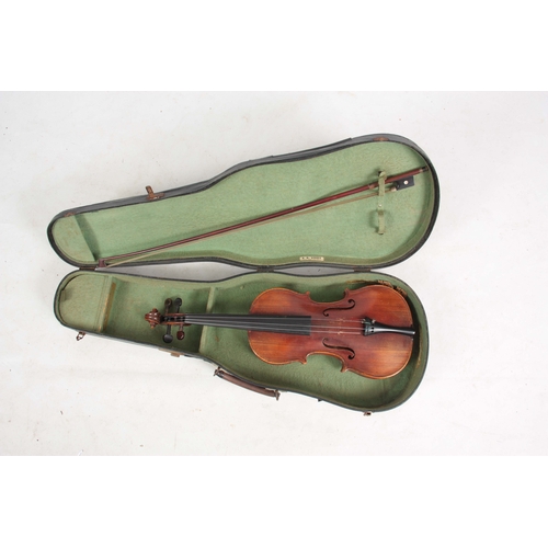 767 - AN ANTIQUE VIOLIN length of back 36cm - sold in a viola case with a bow.